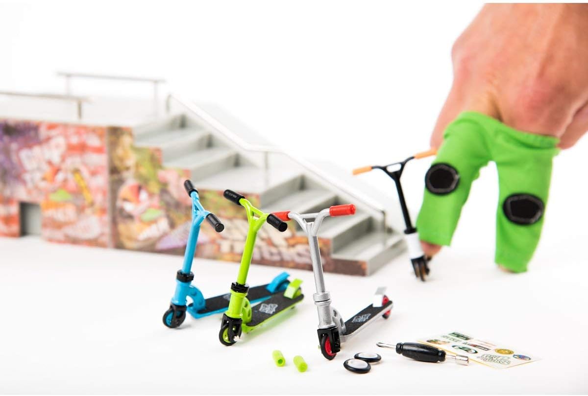 Green Finger Scooter with Extra Wheels and Tools